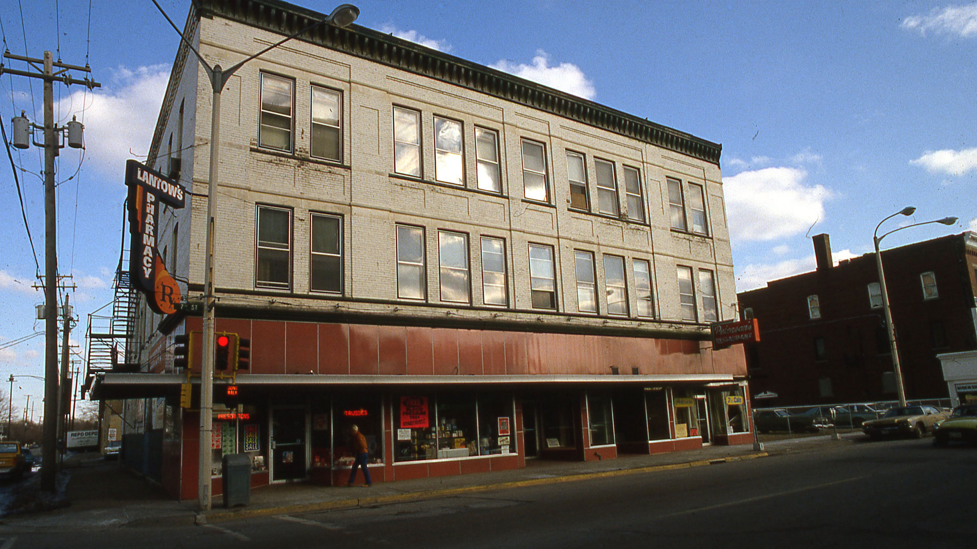 Exterior image of the former Lantow Pharmacy, now known as Katie's Cup and Lantow Lofts in Rockford's Midtown neighborhood.