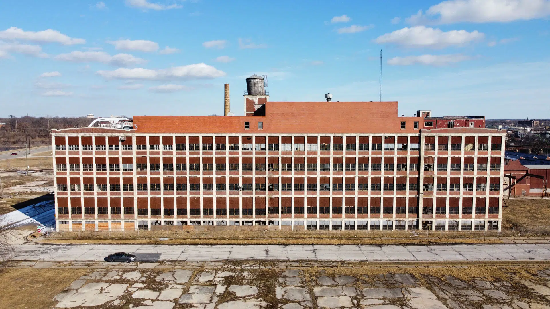 Aerial image of the west elevation of 'Building 5', a historic building on the grounds of Colman Yards in Rockford, Illinois.